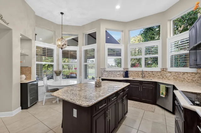 a outdoor dining space with furniture and outdoor view