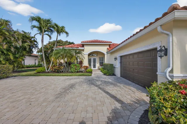 an aerial view of a house with a garden