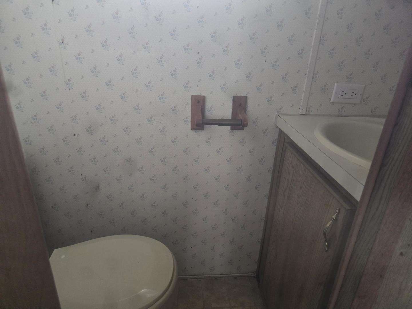4-135 Woodhaven Sublette, IL 61367 - Photo 14 of 15 view of a bathroom with a sink and toilet