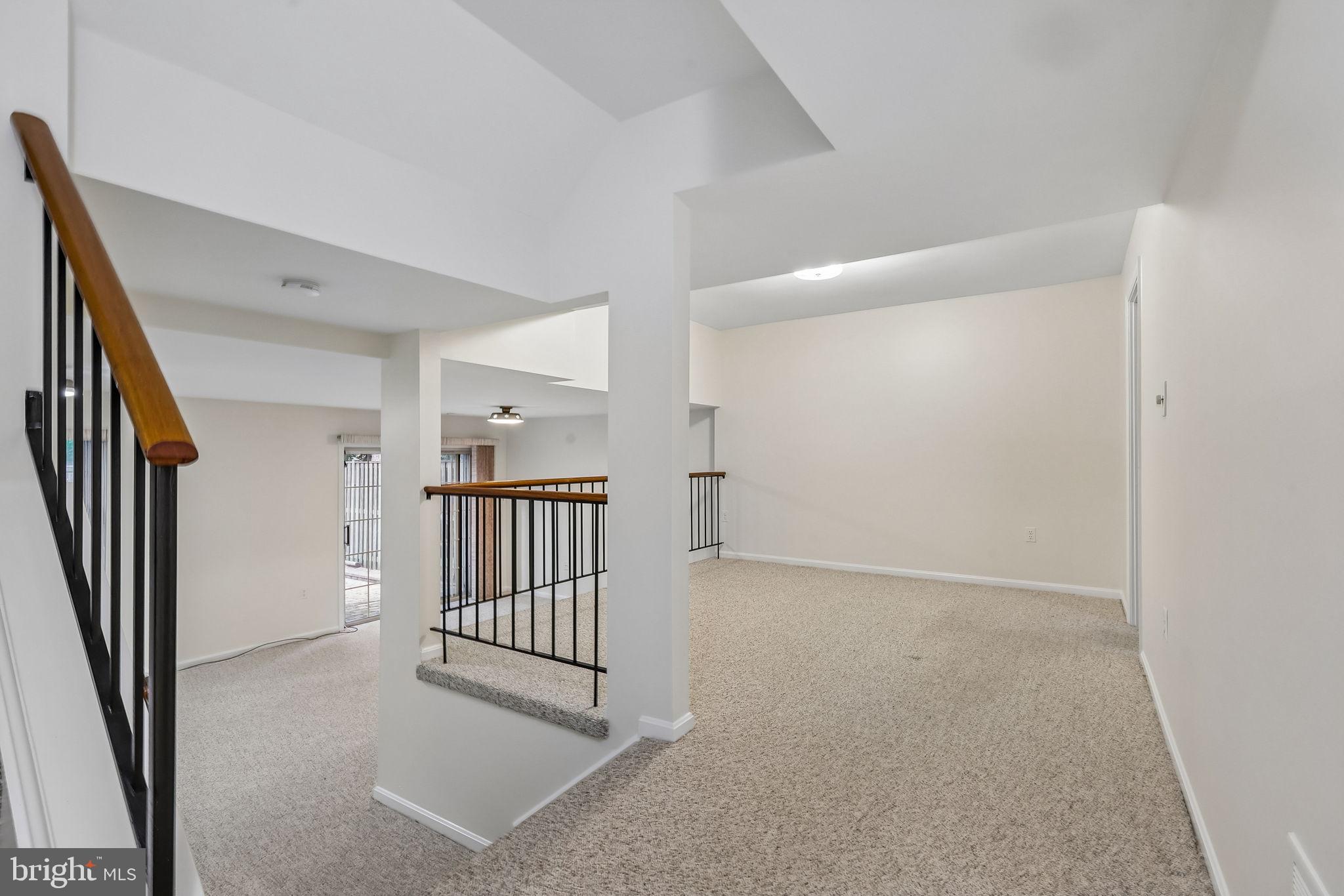 11714 Dry River Court Reston, VA 20191 - Photo 12 of 24 a view of a hallway with staircase