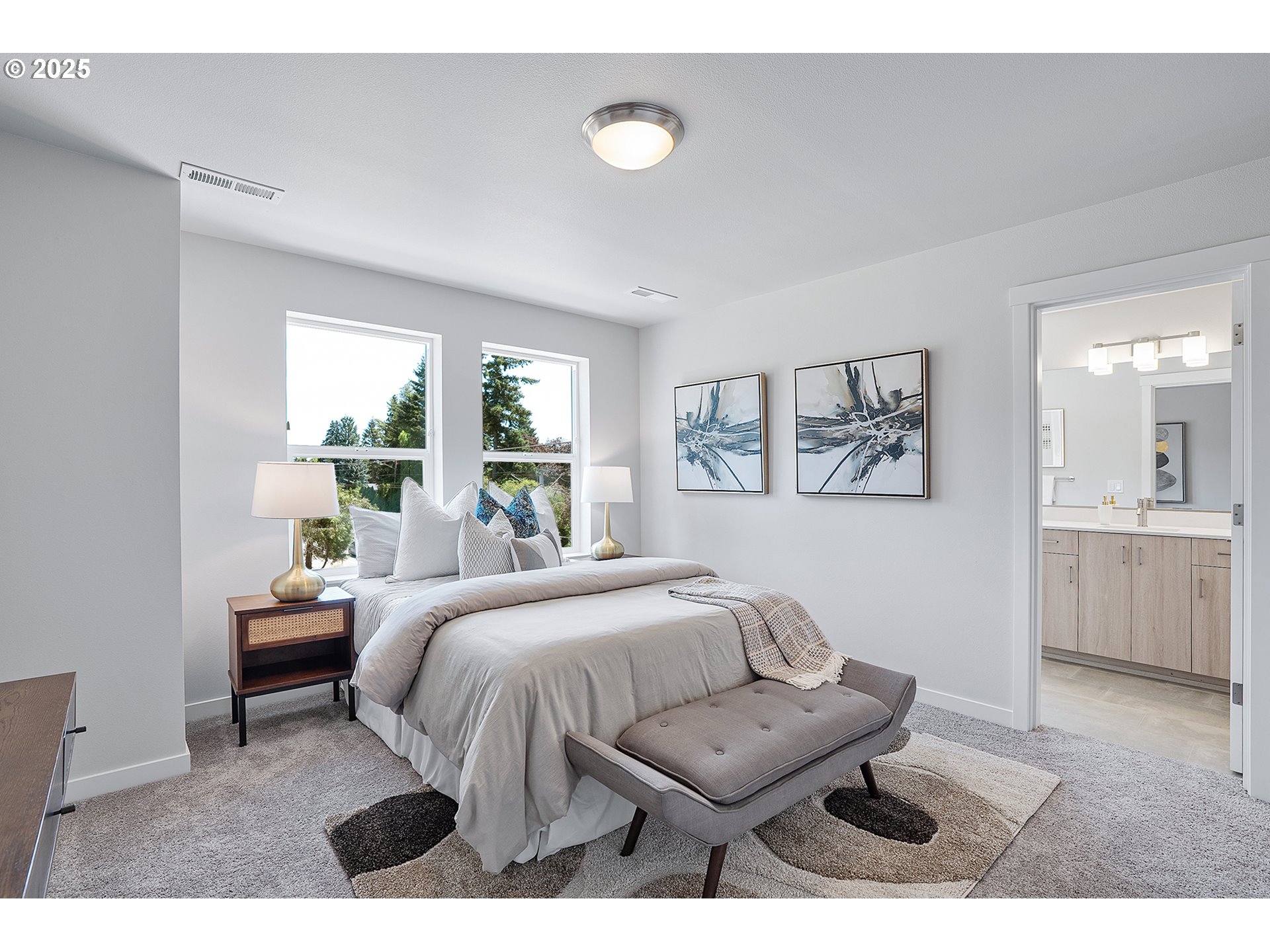 15133 East Burnside Street Portland, OR 97233 - Photo 16 of 21 a bedroom with a bed and a large window