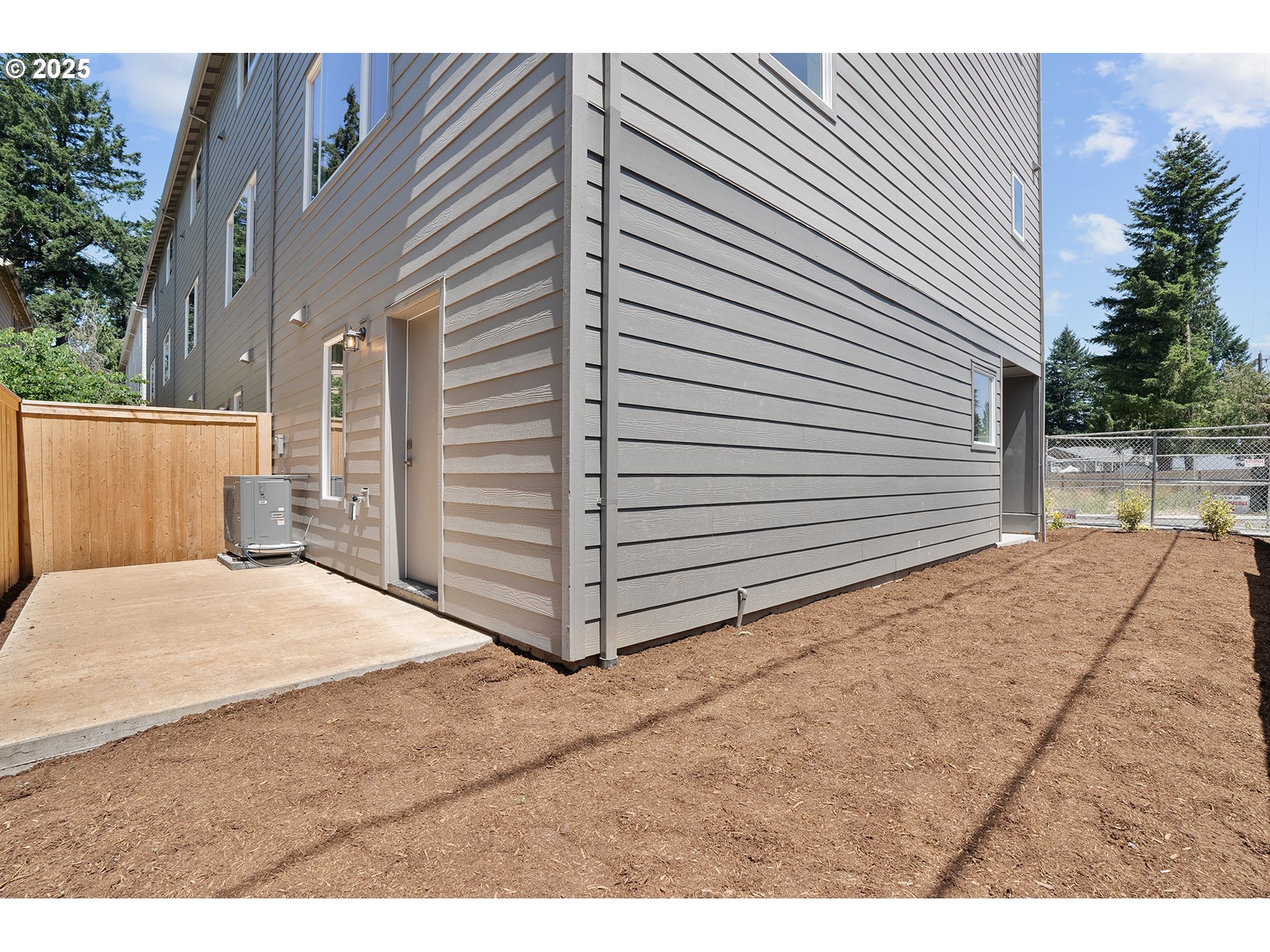 15133 East Burnside Street Portland, OR 97233 - Photo 20 of 21 a view of backyard of house