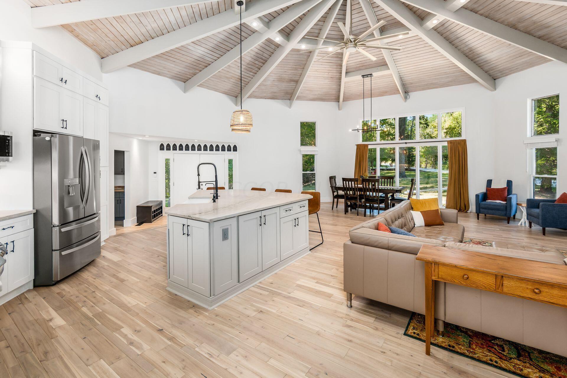 4610 Red Bank Road Galena, OH 43021 - Photo 87 of 88 16 foot ceilings on this open floor plan with kitchen, dining, and great room. Total room measures 27’8” x 33’8”