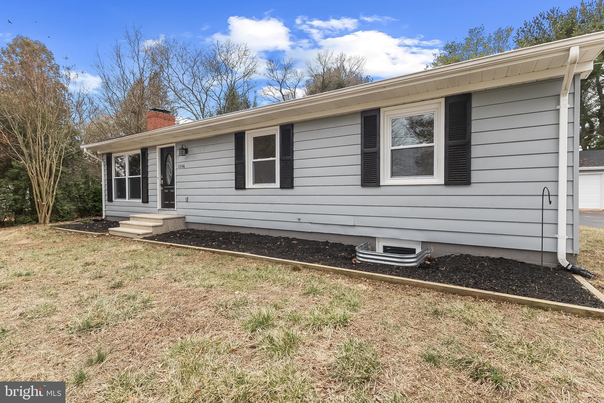 10546 Worton Road Worton, MD 21678 - Photo 2 of 33 a front view of a house with a yard