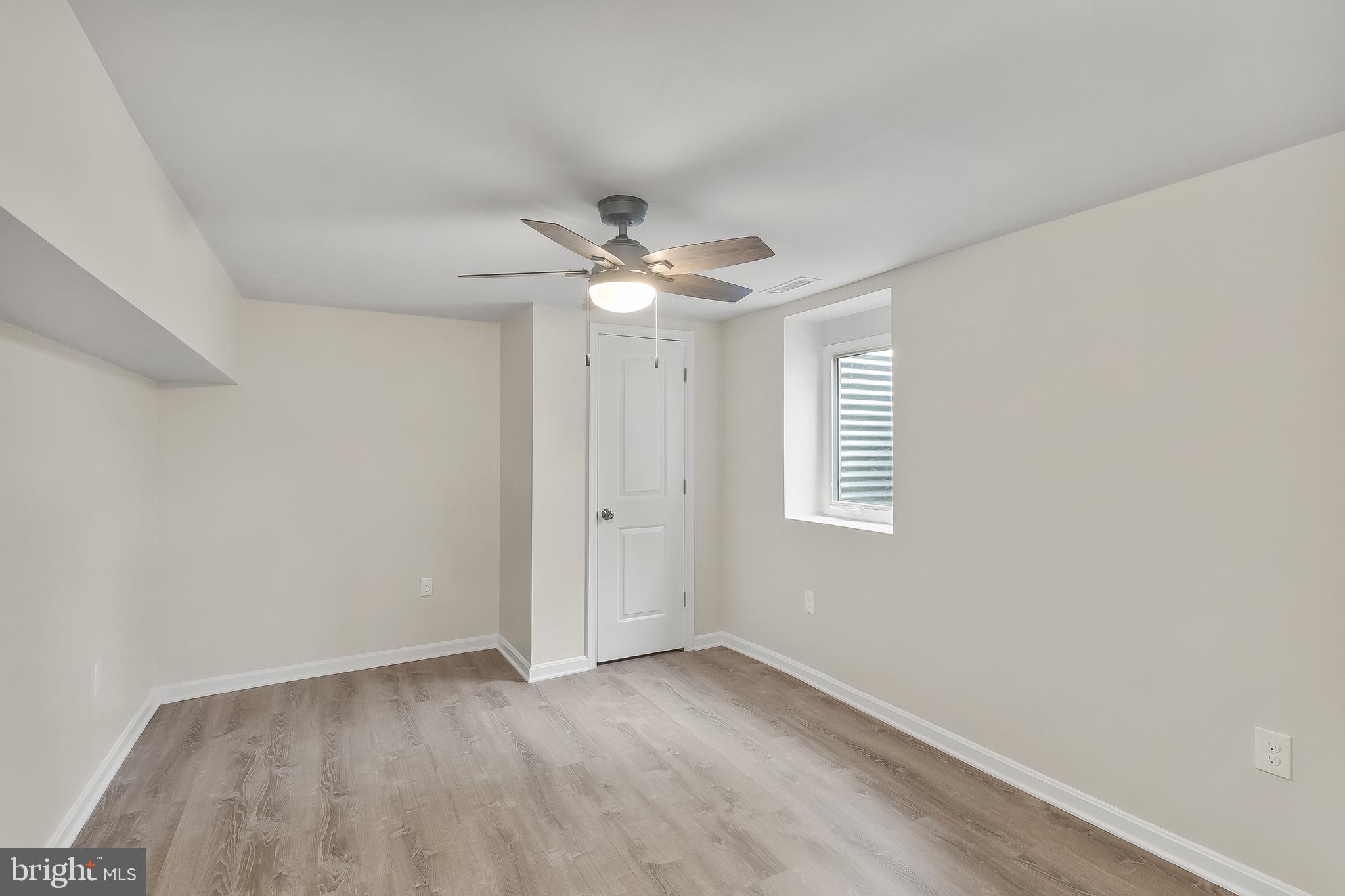 10546 Worton Road Worton, MD 21678 - Photo 25 of 33 a view of an empty room with a window
