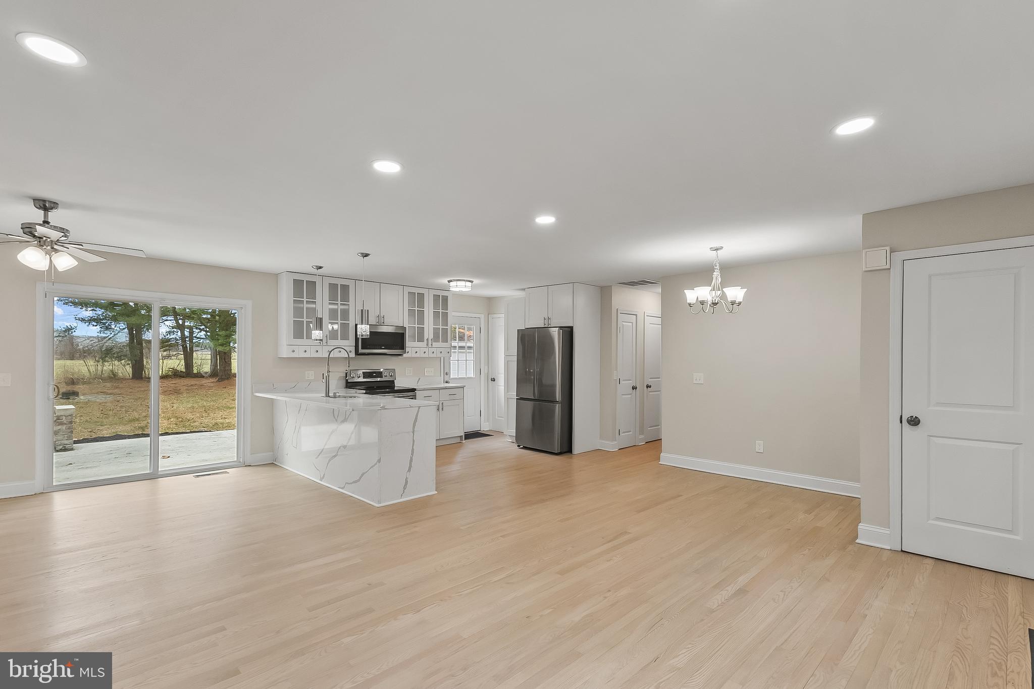 10546 Worton Road Worton, MD 21678 - Photo 3 of 33 a view of a kitchen with furniture and wooden floor