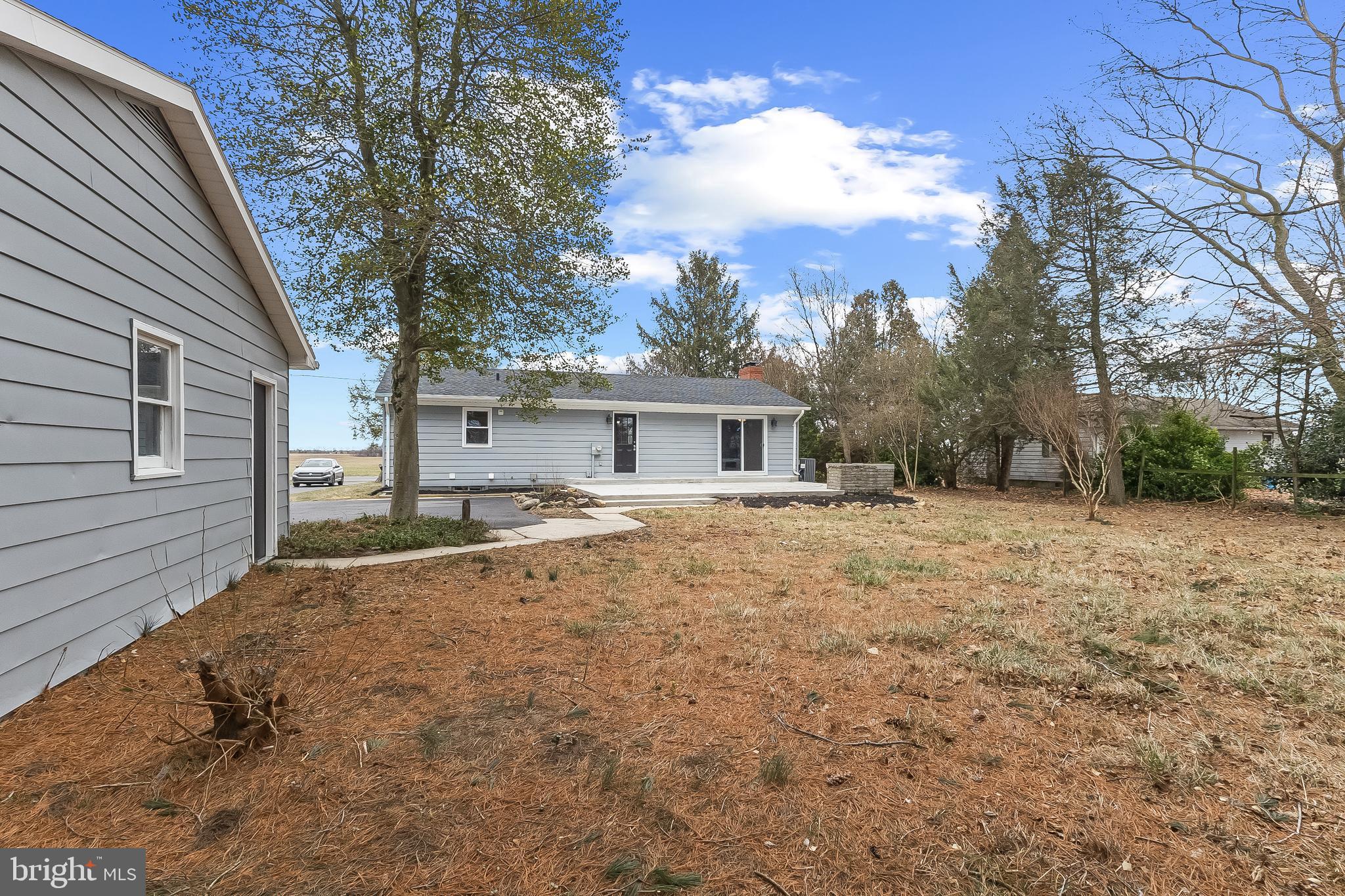 10546 Worton Road Worton, MD 21678 - Photo 33 of 33 a house with trees in front of it