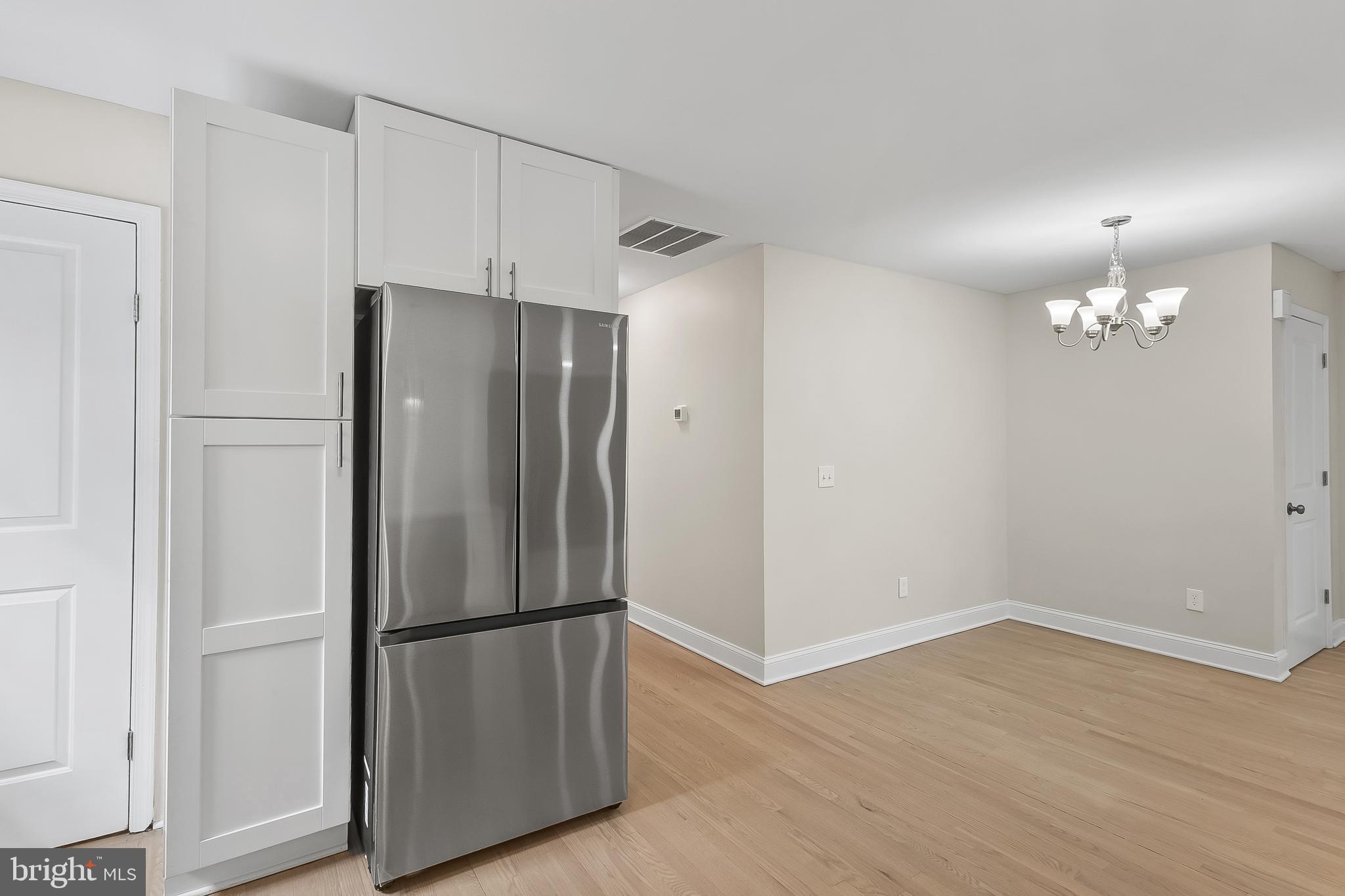 10546 Worton Road Worton, MD 21678 - Photo 8 of 33 a metallic refrigerator freezer sitting in a kitchen