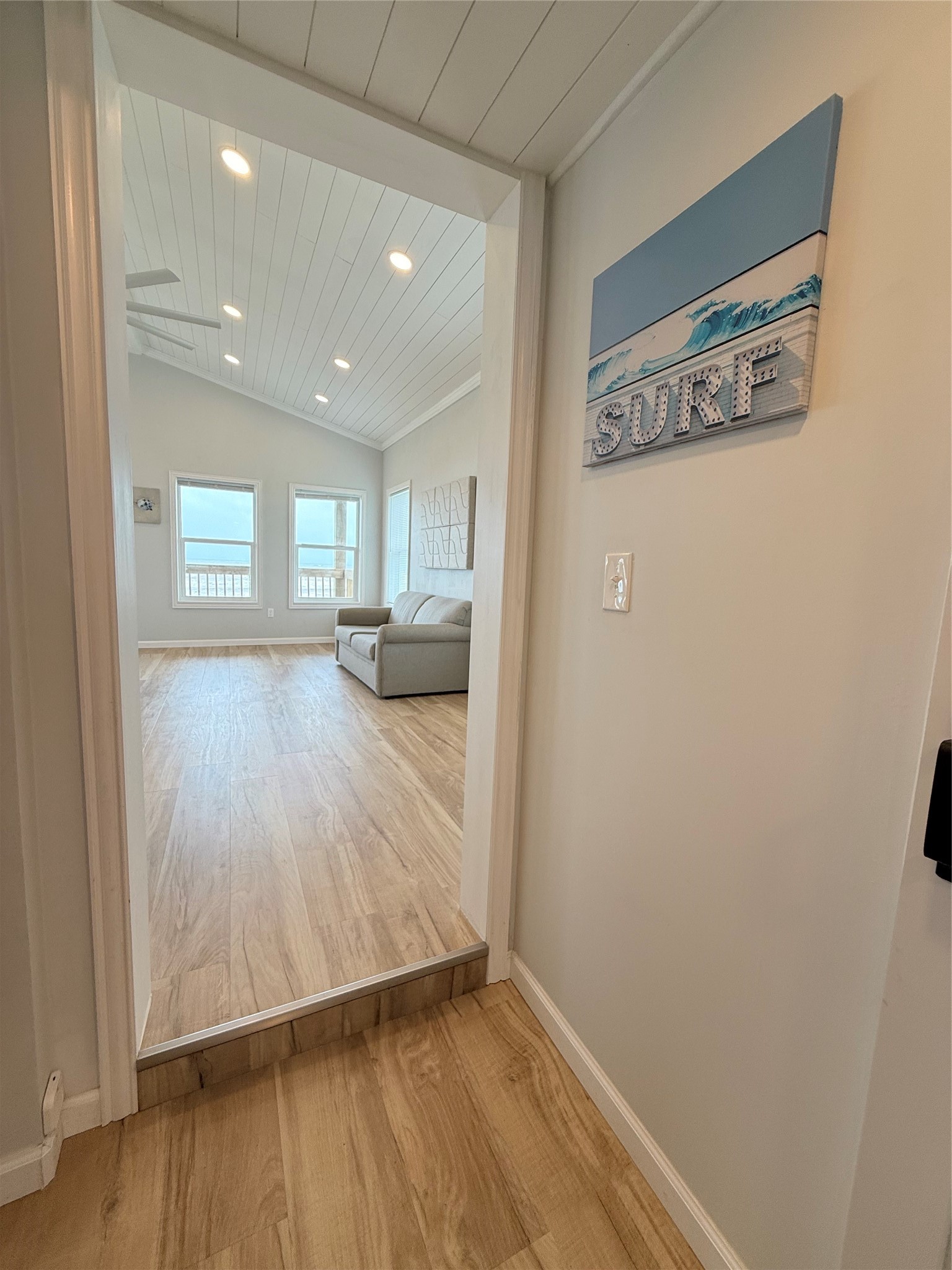 2154 County Road 230 Sargent, TX 77414 - Photo 21 of 30 a view of a room with wooden floor and a window