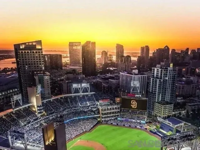 a water heater room with a wooden floor