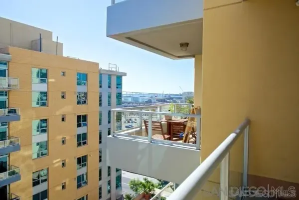 a view of balcony with furniture