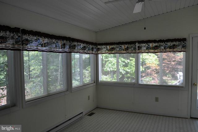 11538 Durango Road Lusby, MD 20657 - Photo 6 of 15 a view of an empty room with a window