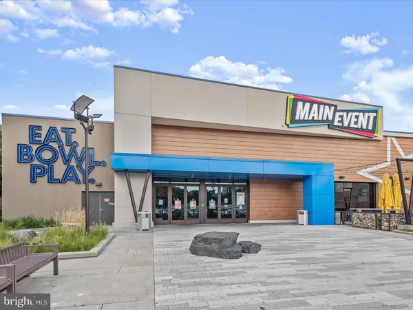 a front view of a building with a street