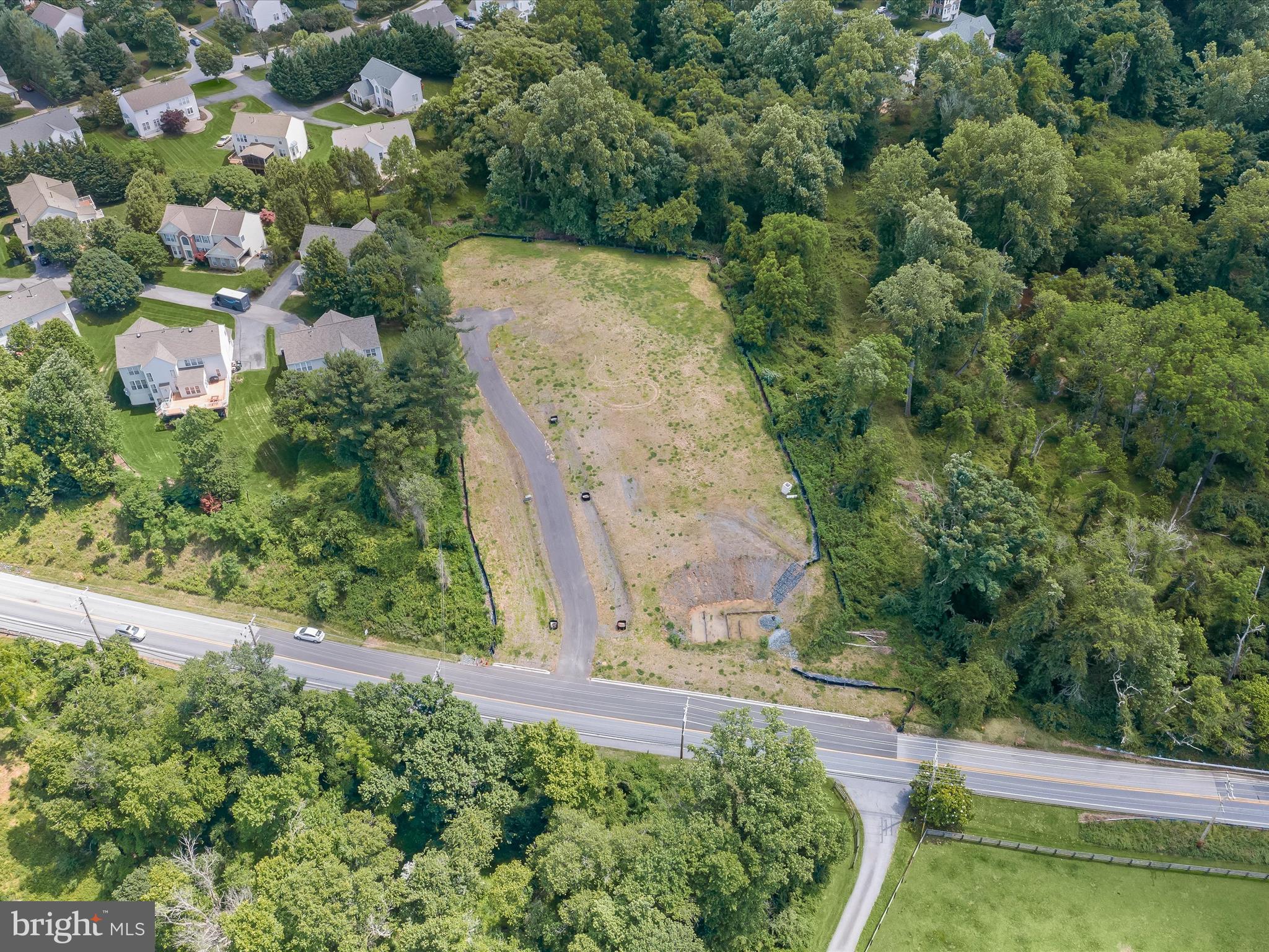 6317 Guilford Road Clarksville, MD 21029 - Photo 3 of 28 an aerial view of a house with a yard
