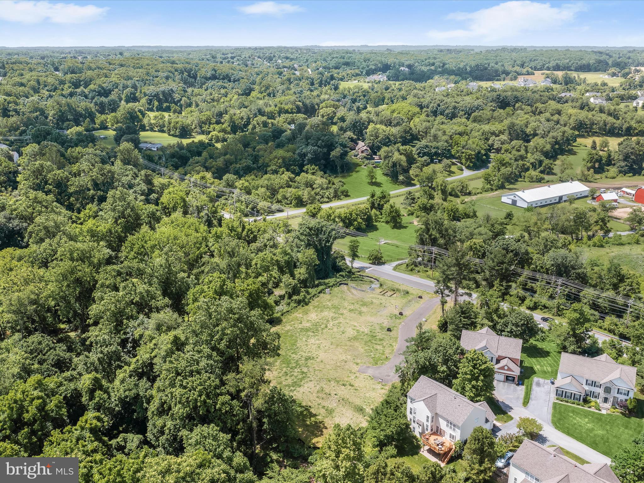 6317 Guilford Road Clarksville, MD 21029 - Photo 7 of 28 an aerial view of a houses with a yard