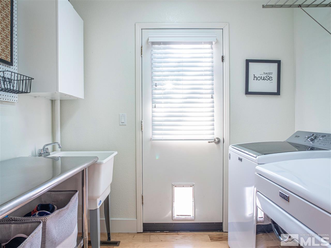 2435 Foley Way Reno, NV 89509 - Photo 13 of 32 a room with a sink cabinets and a window