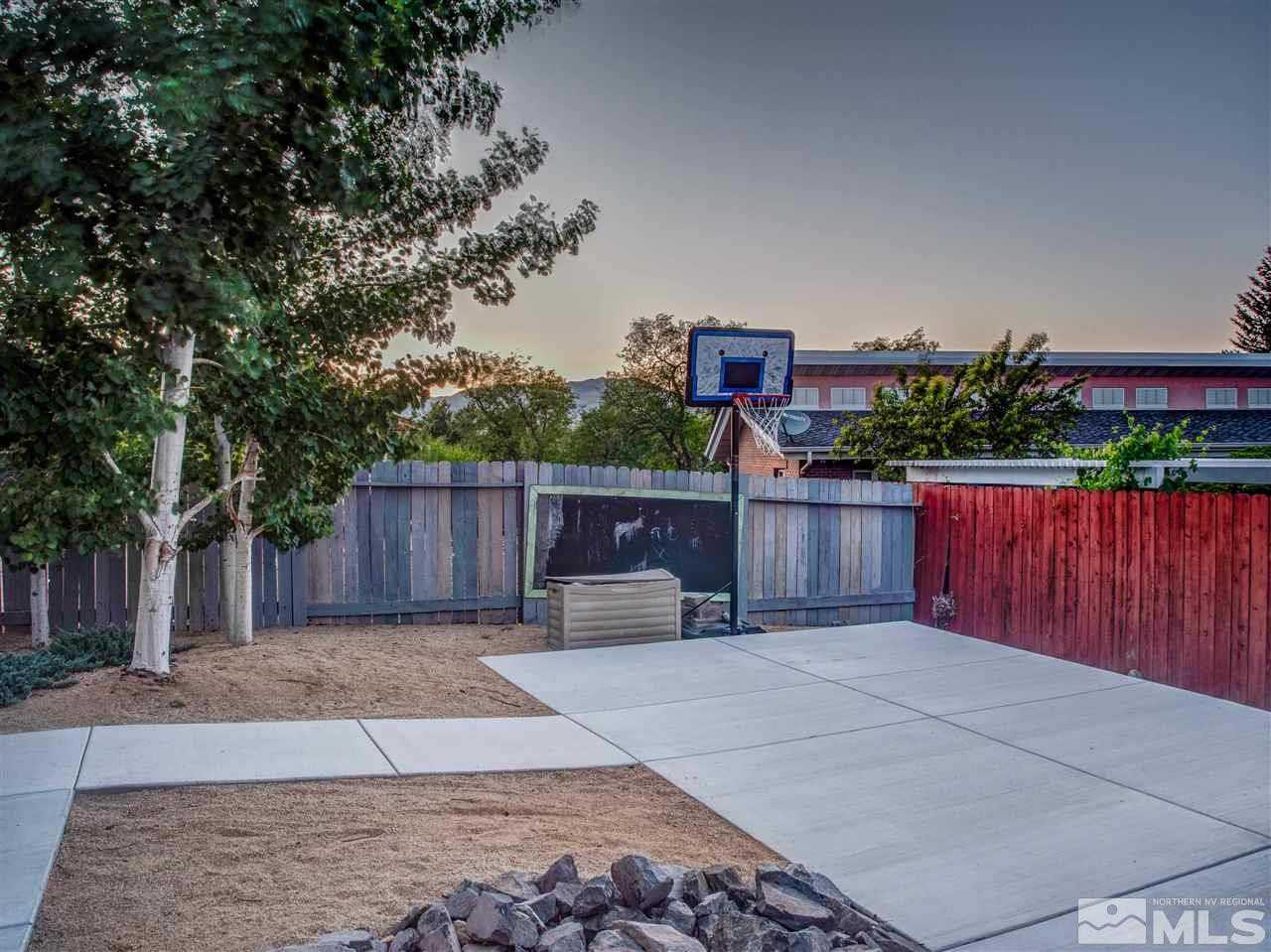 2435 Foley Way Reno, NV 89509 - Photo 30 of 32 a view of a backyard