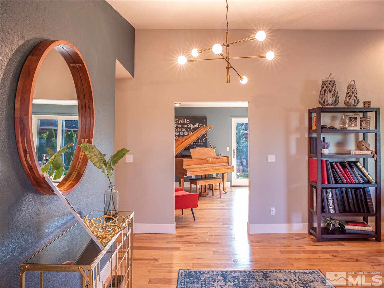 2435 Foley Way Reno, NV 89509 - Photo 3 of 32 a view of an entryway with wooden floor