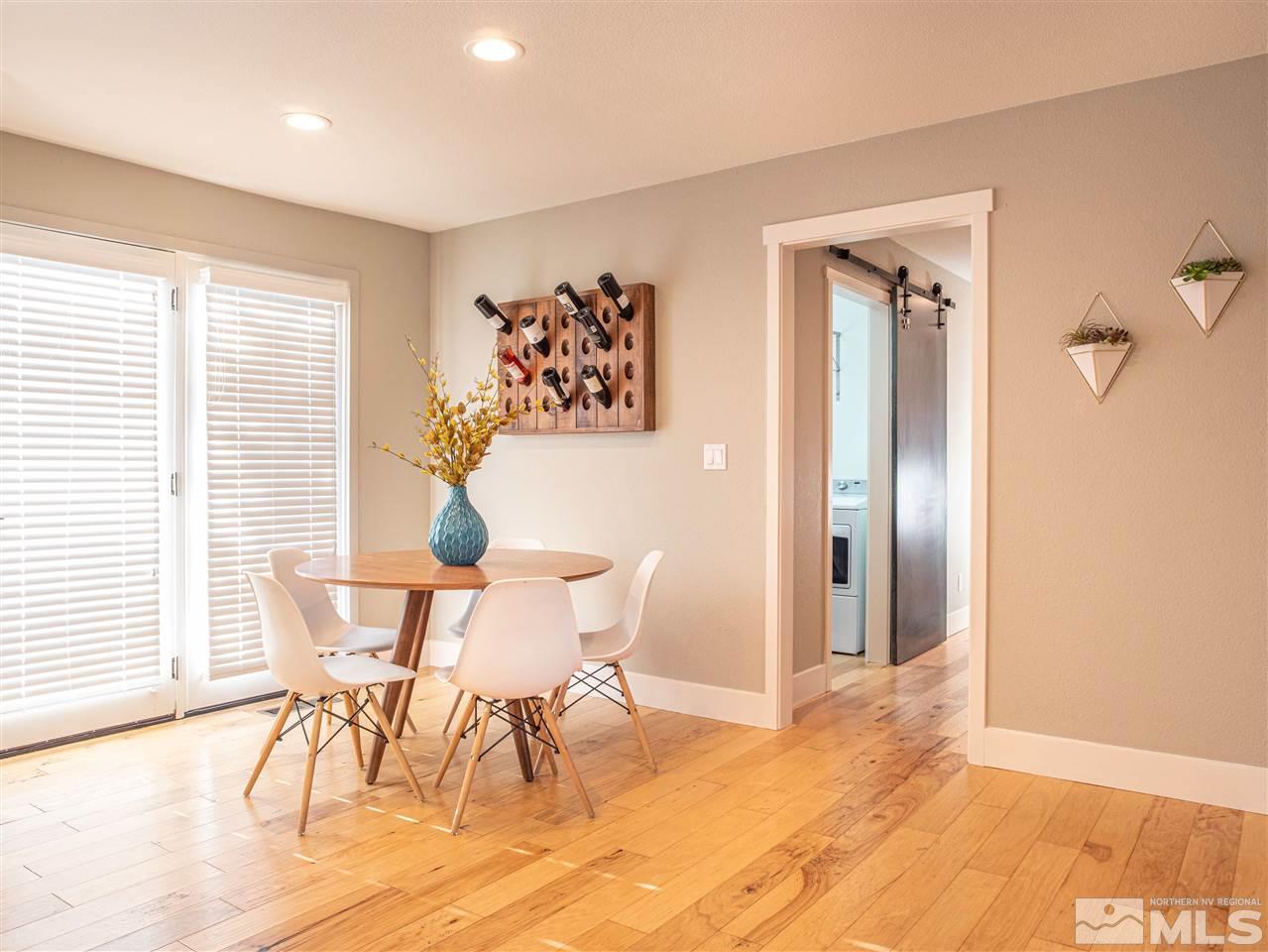 2435 Foley Way Reno, NV 89509 - Photo 8 of 32 a view of a dining room with furniture and wooden floor