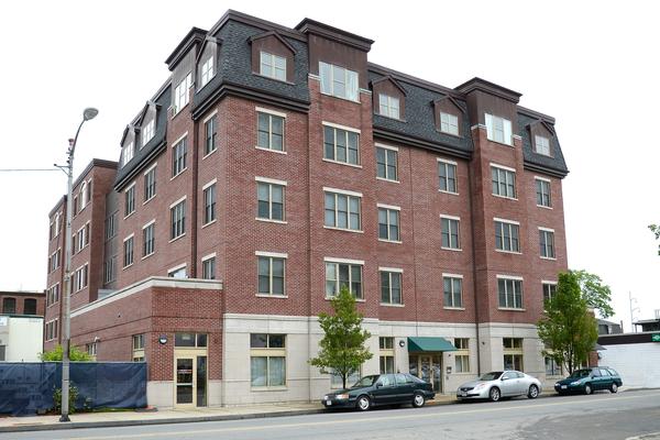 116-128 Rantoul Street, Unit 507 Beverly, MA 01915 - Photo 2 of 13 a front view of a building
