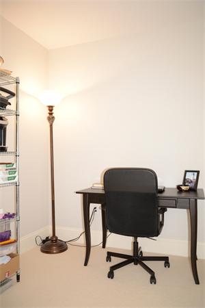 116-128 Rantoul Street, Unit 507 Beverly, MA 01915 - Photo 10 of 13 a view of a workspace with furniture