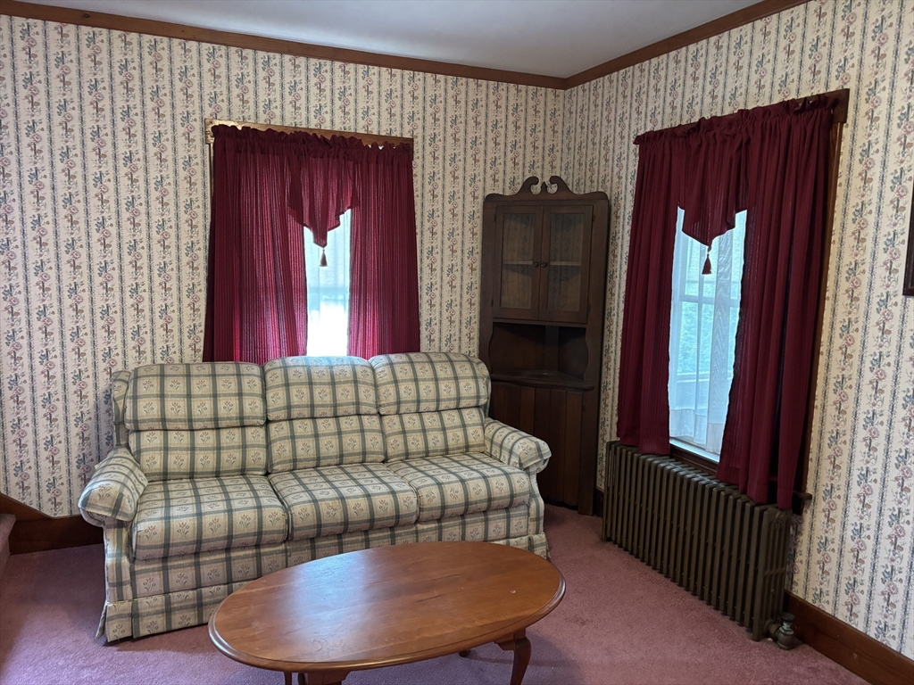 577 County Street Taunton, MA 02780 - Photo 7 of 23 a living room with furniture