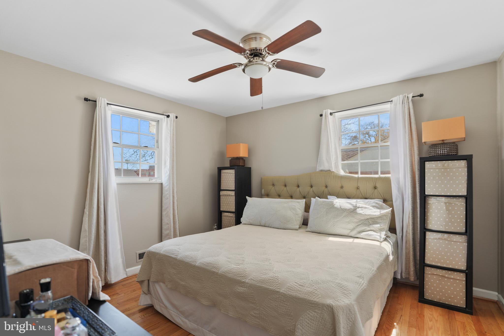 3414 Farthing Drive Silver Spring, MD 20906 - Photo 14 of 23 a bedroom with a bed and a ceiling fan