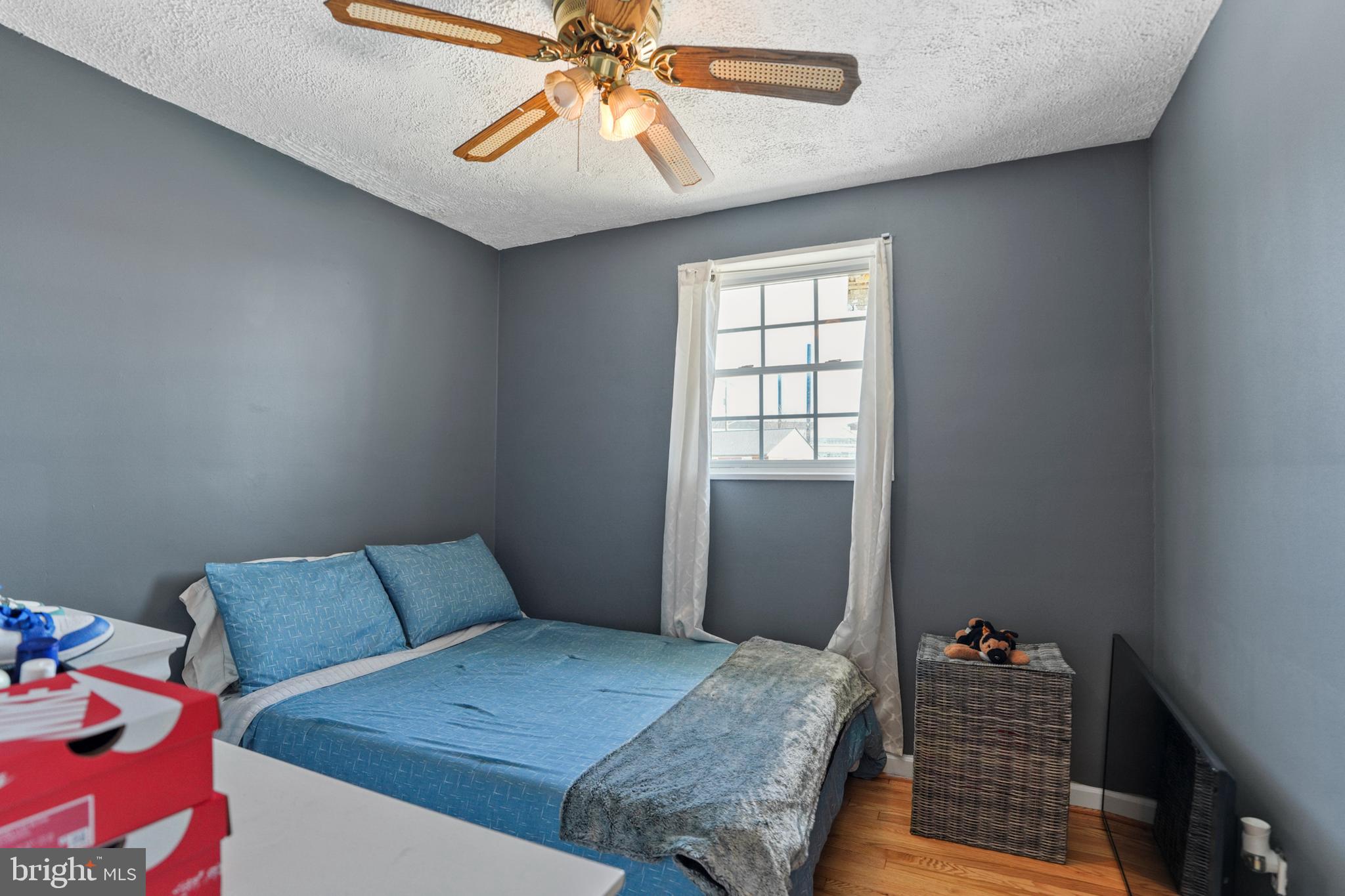 3414 Farthing Drive Silver Spring, MD 20906 - Photo 15 of 23 a bedroom with a bed and a chandelier