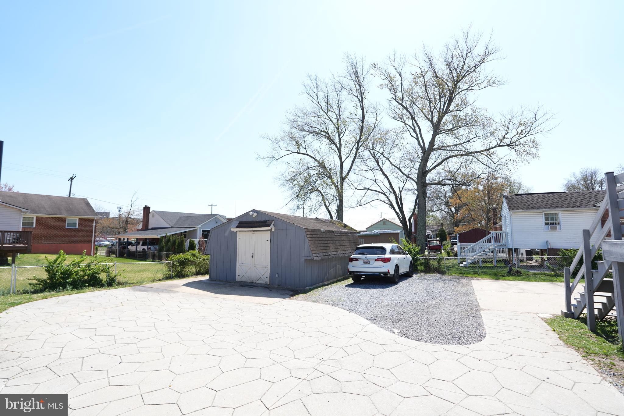 3414 Farthing Drive Silver Spring, MD 20906 - Photo 23 of 23 a view of a street with a cars parked in front of it