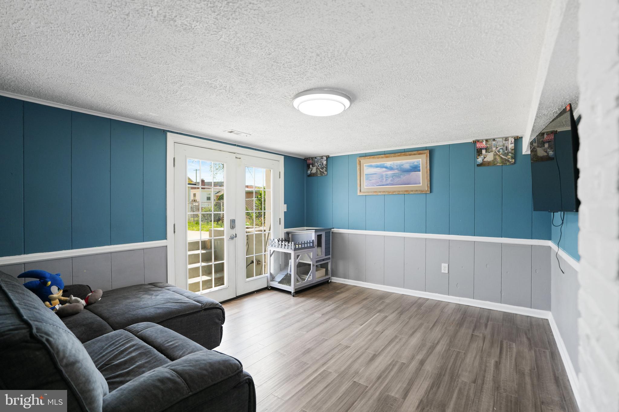 3414 Farthing Drive Silver Spring, MD 20906 - Photo 10 of 23 a living room with furniture and a wooden floor