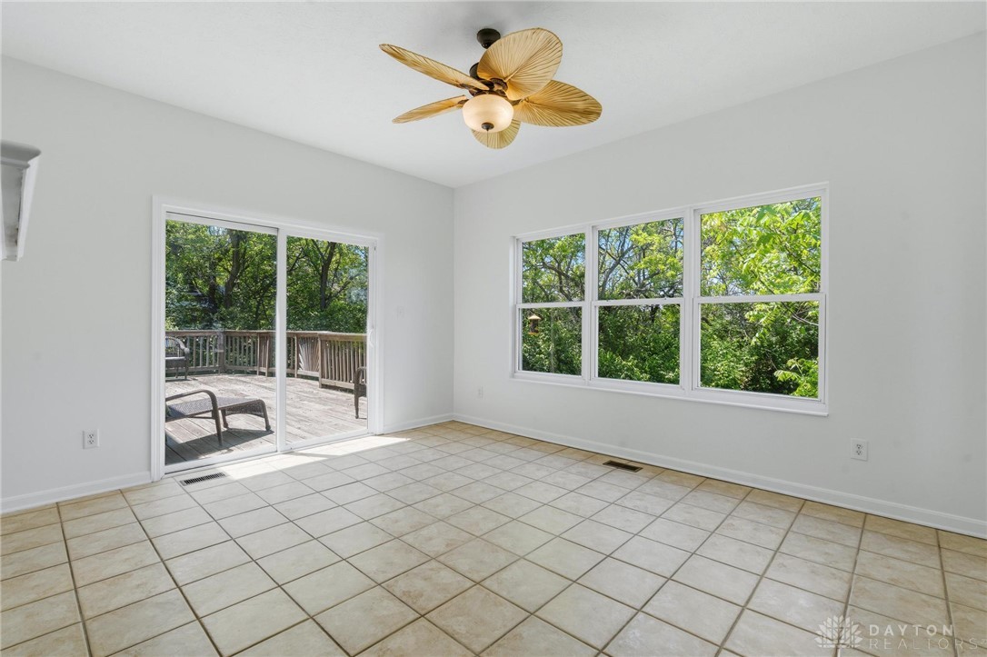 70 Martin Lane Springboro, OH 45066 - Photo 21 of 69 This bright room features abundant natural light and seamless indoor-outdoor living.