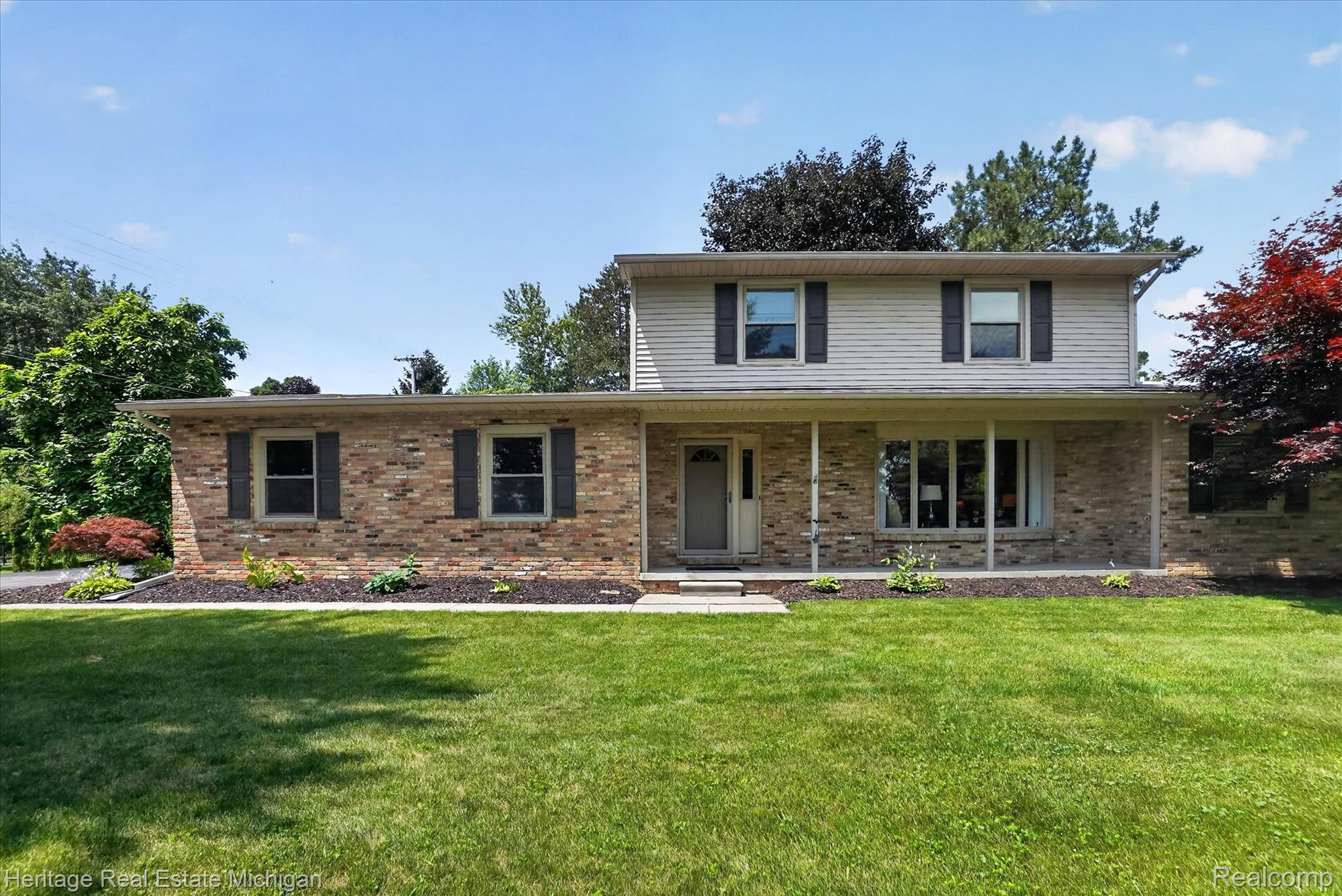 14038 North Hogan Road Linden, MI 48451 - Photo 48 of 53 Two-story residence featuring brick and siding exterior