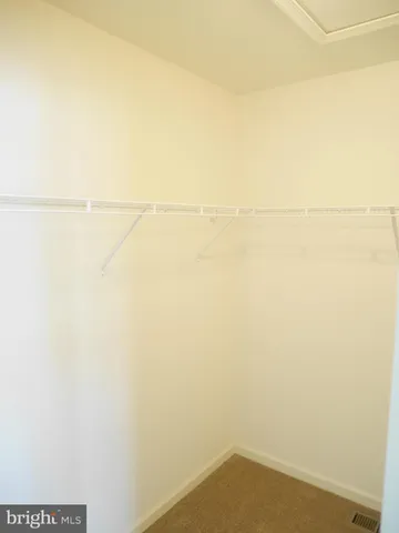 a bathroom with a close shower view