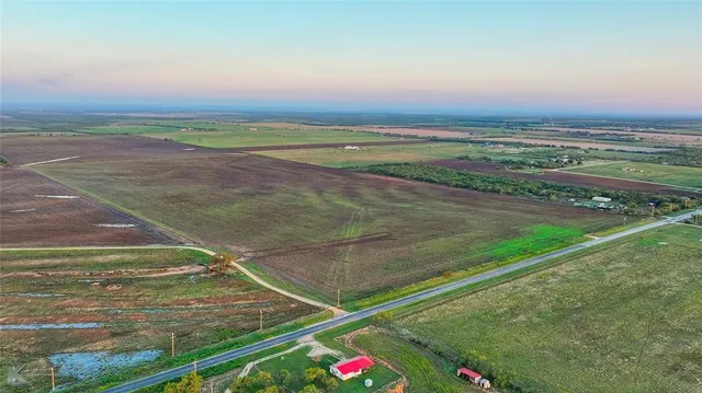 a view of an outdoor space and tennis court