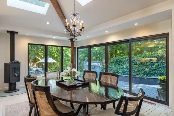 a view of a dining room with furniture window and outside view