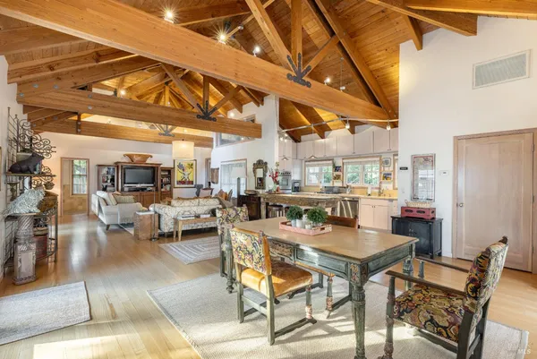 a kitchen with stainless steel appliances granite countertop a sink and cabinets