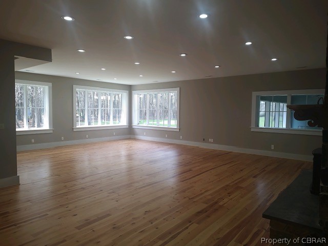 173 Lillys Neck Road Moon, VA 23119 - Photo 24 of 48 Spare room with hardwood / wood-style flooring