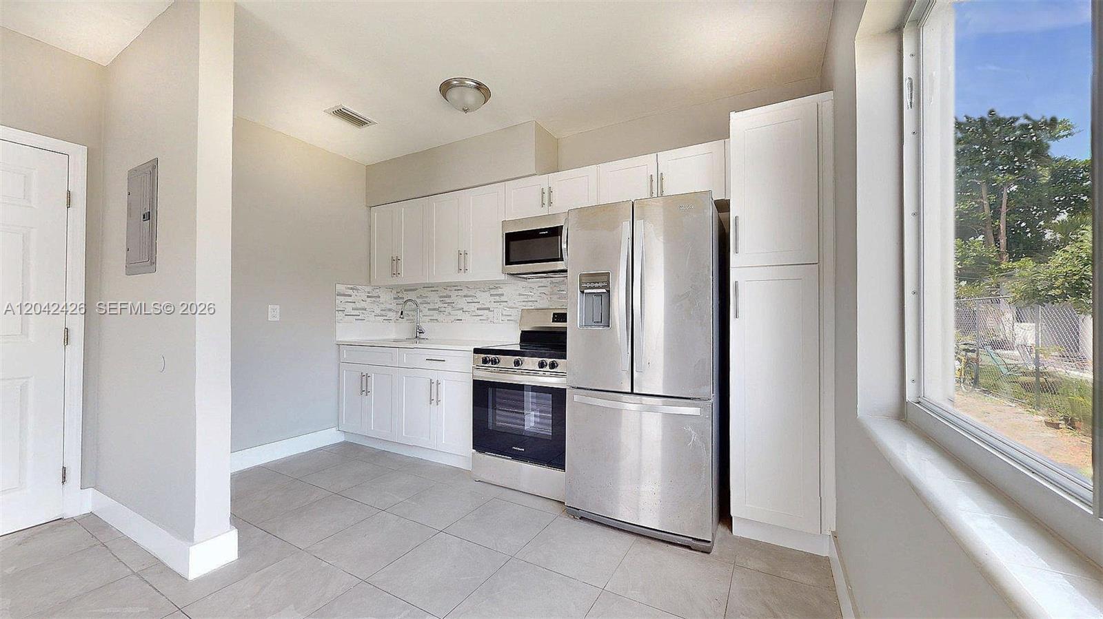 74 West 15th Street, Unit 1 Hialeah, FL 33010 - Photo 10 of 23 Kitchen