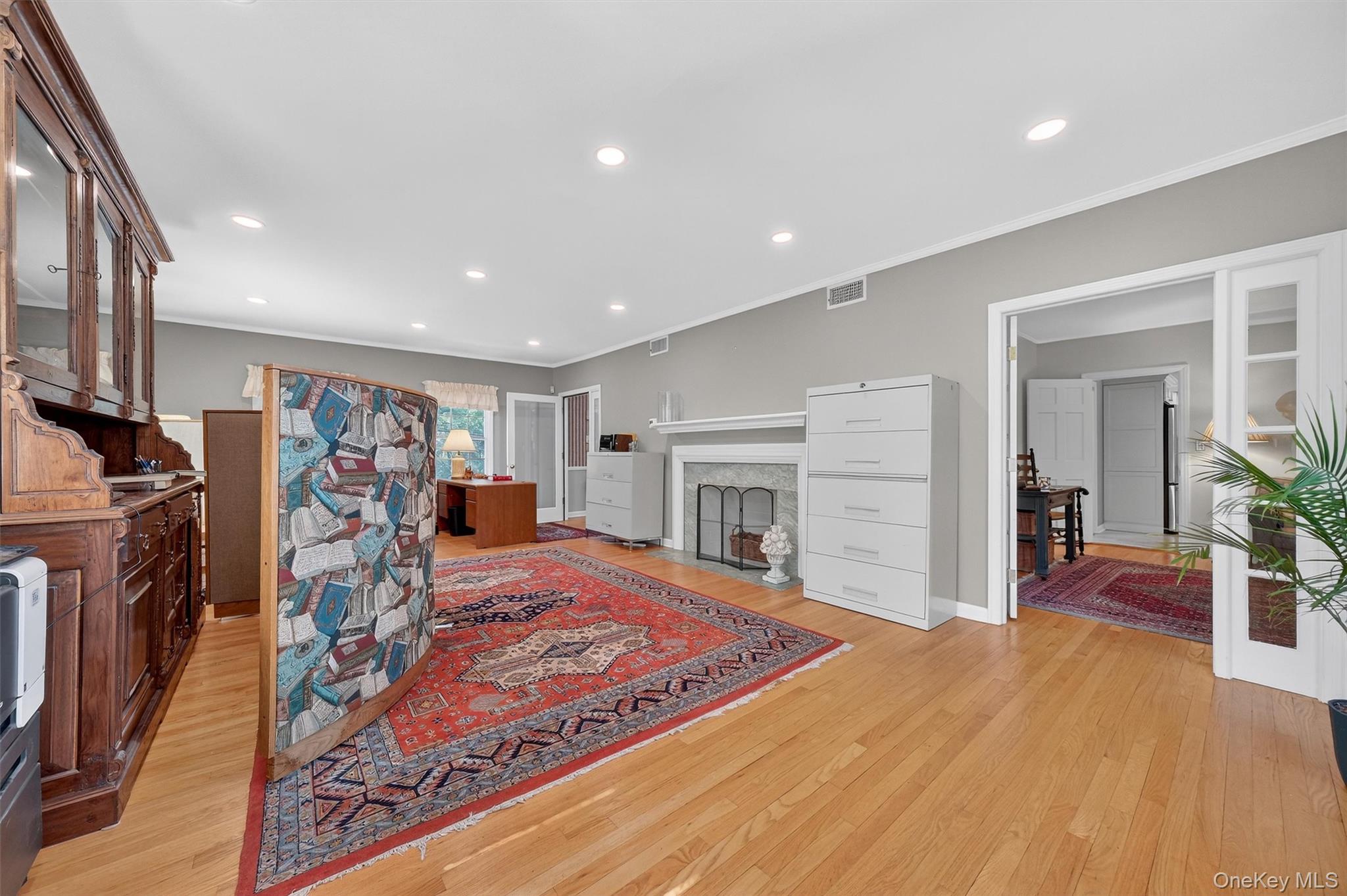 1436 Highway 52 Fishkill, NY 12524 - Photo 10 of 46 Living room with hardwood flooring, large windows and fireplace