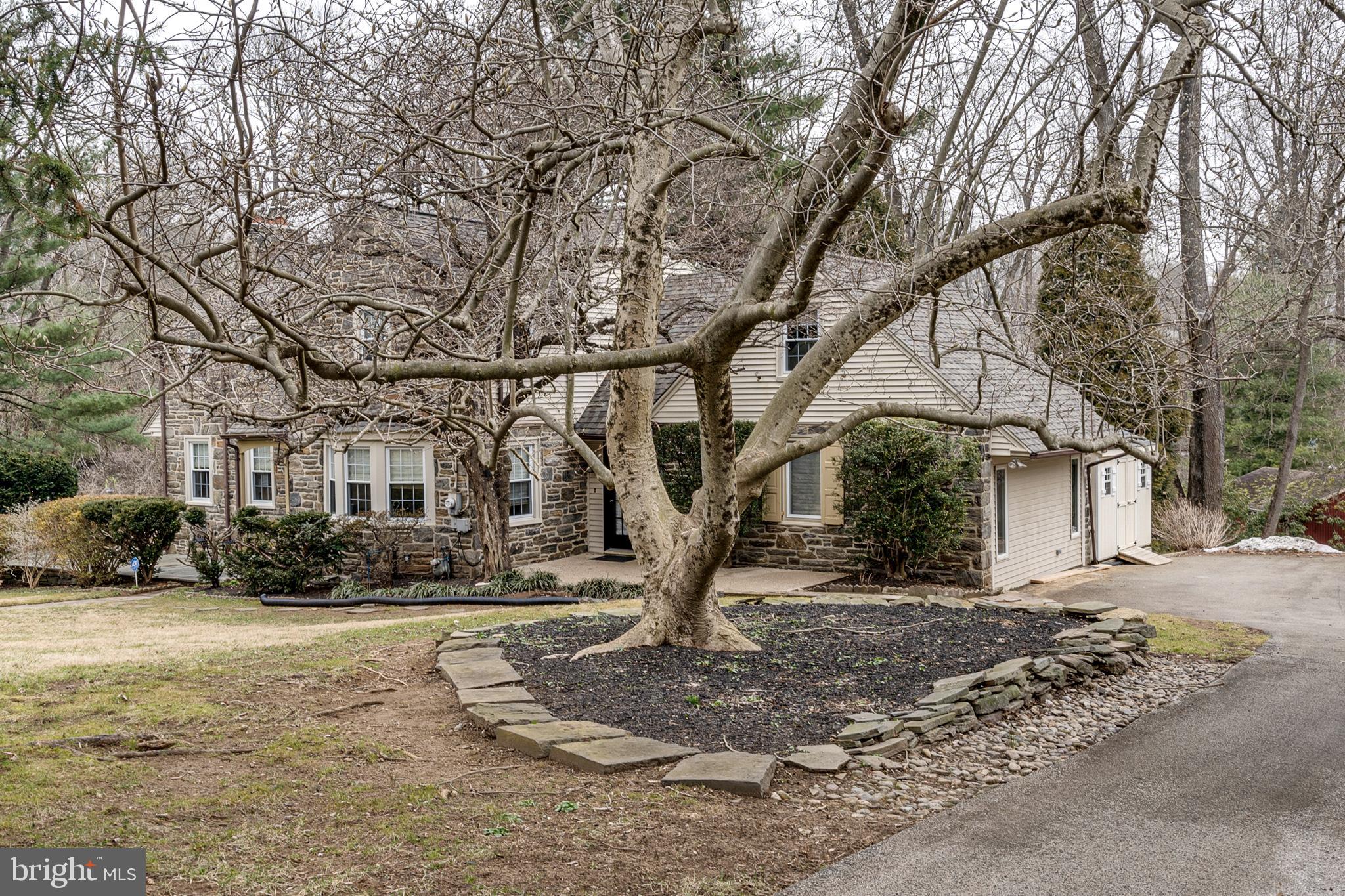 511 Broad Acres Road Narberth, PA 19072 - Photo 32 of 34 Side patio with stone firepit