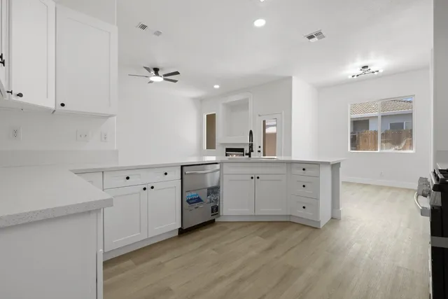 a bathroom with a sink a vanity and a mirror