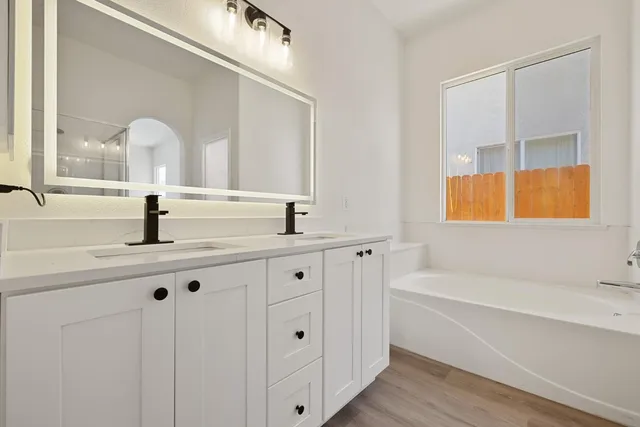 a front view of a house with a garage