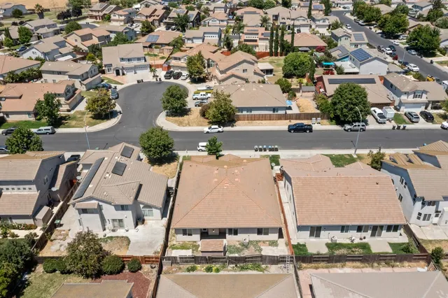 an aerial view of a city with ocean view
