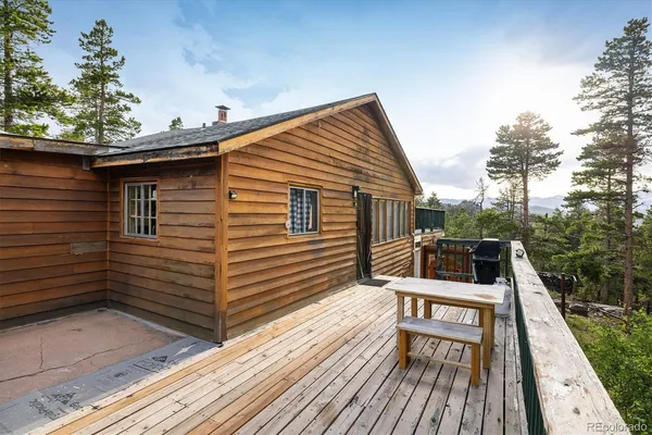 a view of a house with a deck