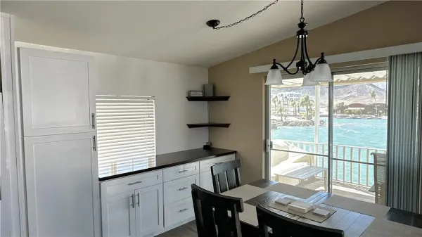 a bedroom with furniture and window