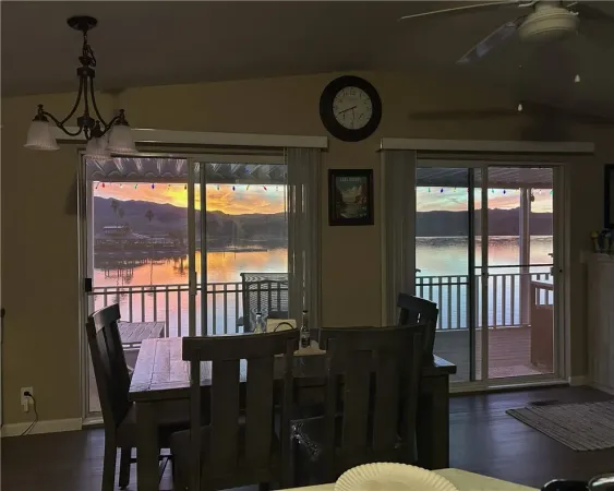 a view of a roof deck with furniture