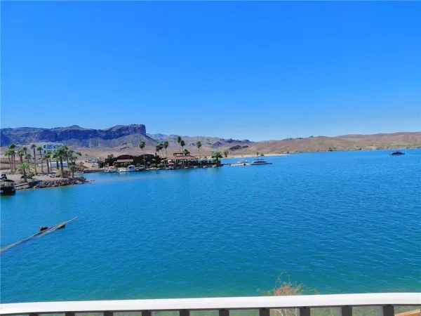 a view of a balcony with chairs