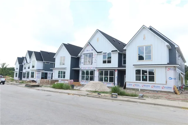 a view of a street in front of a building