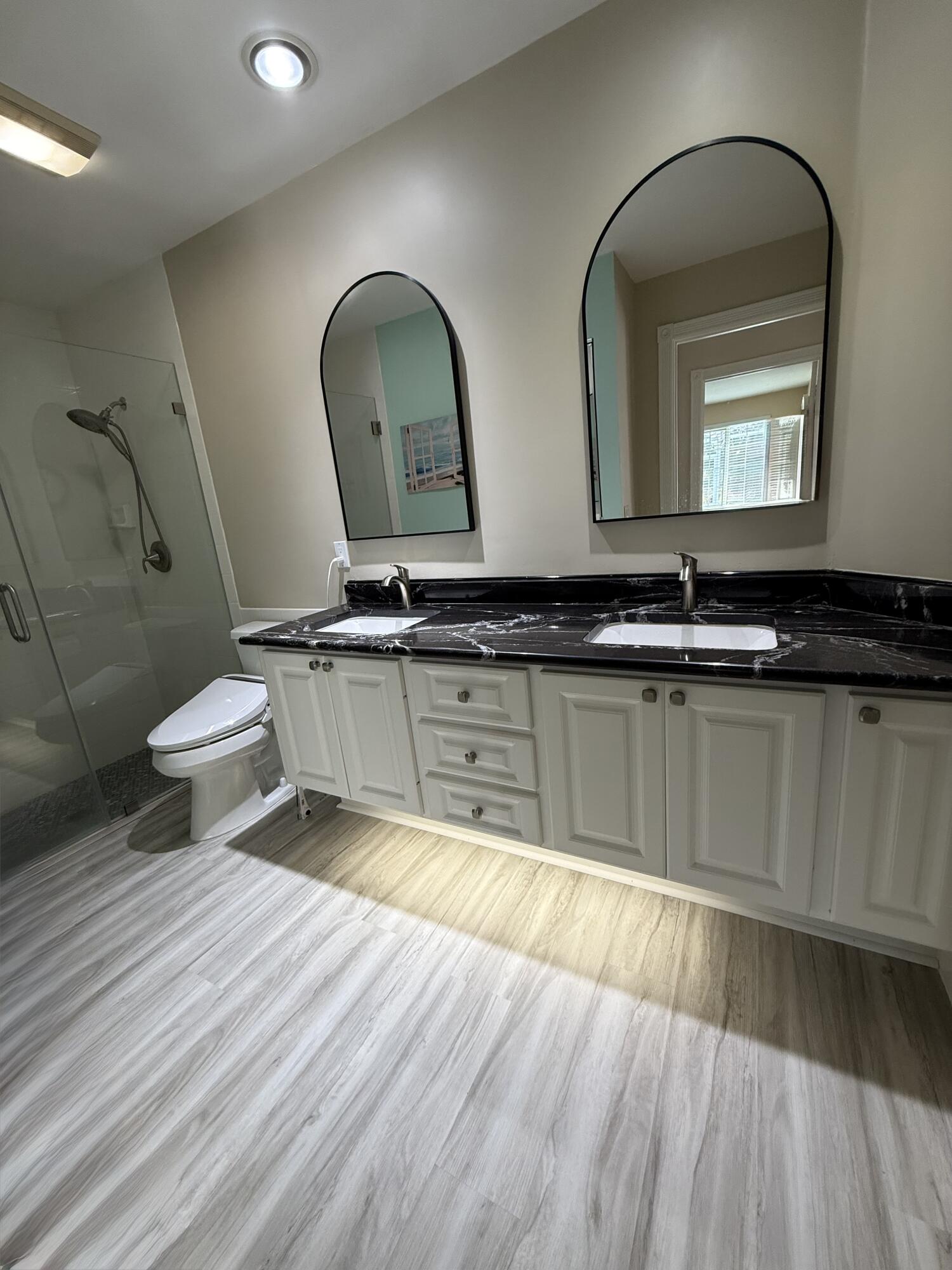 3484 Southeast Cormorant Place Hobe Sound, FL 33455 - Photo 17 of 67 master bath1