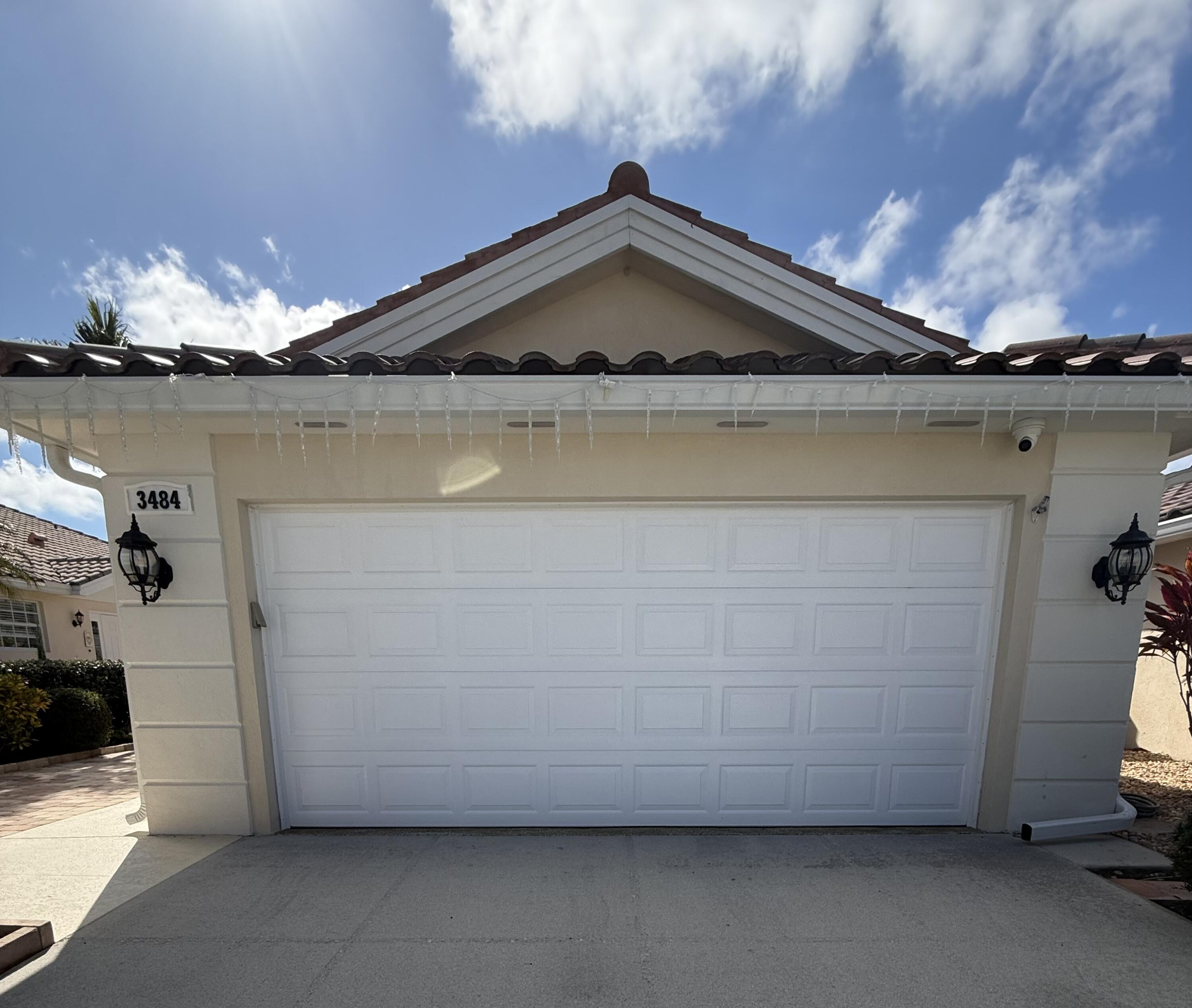 3484 Southeast Cormorant Place Hobe Sound, FL 33455 - Photo 28 of 67 garage door